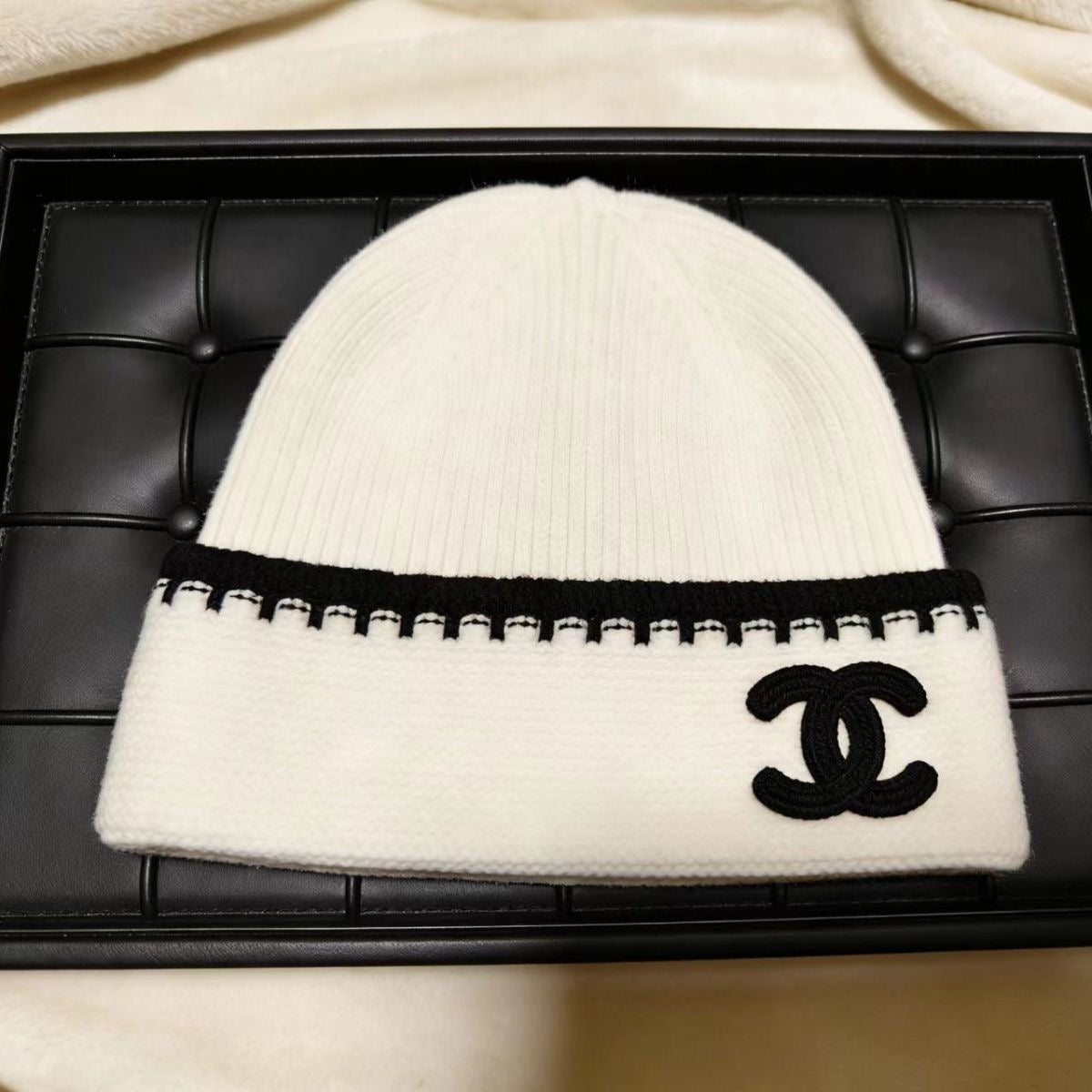Black and white two-tone knit hat