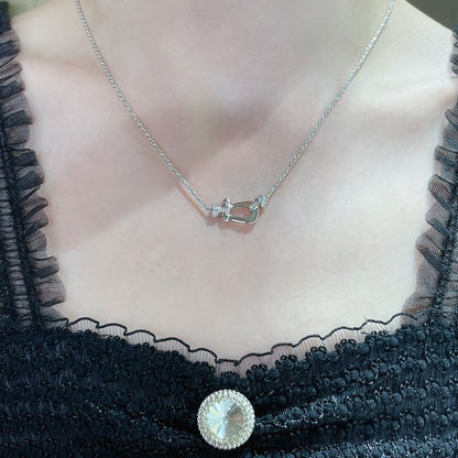 Luxurious high-end delicate necklace with a horseshoe clasp