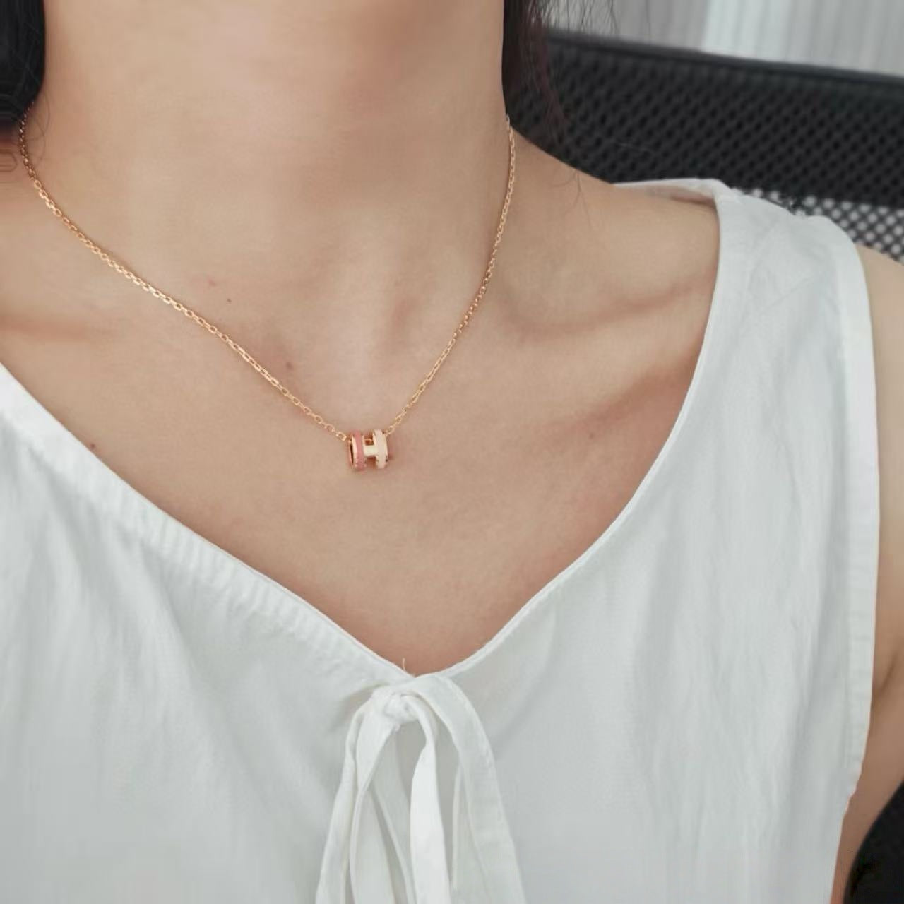 Two-tone enamel H necklace