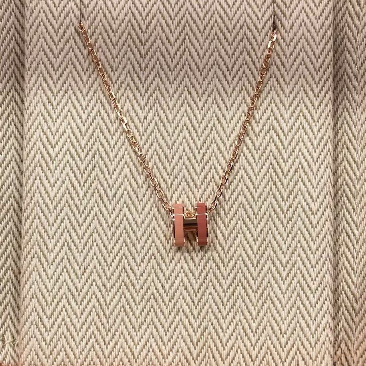 Two-tone enamel H necklace